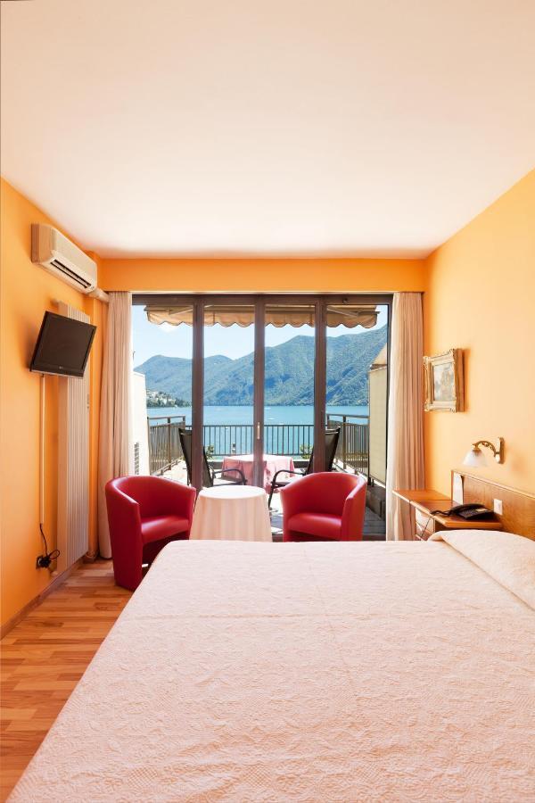 Swiss Lodge Nassa Garni Lugano Quarto foto